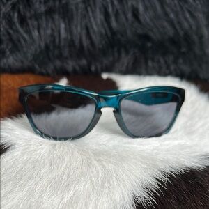 Teal Oakley Jupiter Sunglasses